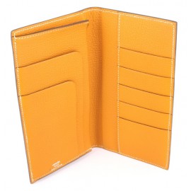 Portefeuille HERMES EVELYN en cuir jaune orangé