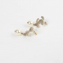 Boucles d'oreille CHANEL perles en verre et strass