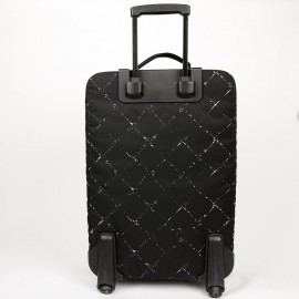  a reparer  roue Valise CHANEL en toile 