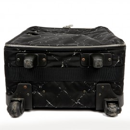  a reparer  roue Valise CHANEL en toile 