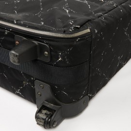  a reparer  roue Valise CHANEL en toile 