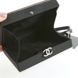 Minaudière CHANEL piqué noir strass