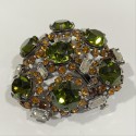 Broche sertie de cabochons verts et baguettes cristal