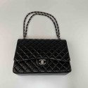 CHANEL Maxi Jumbo Handbag in Black Lamb Leather