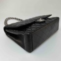 CHANEL Maxi Jumbo Handbag in Black Lamb Leather