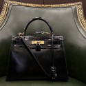 Kelly 28 HERMES box noir Vintage