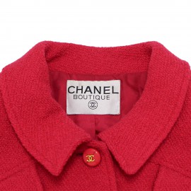 Veste T 36 CHANEL en tweed rose avec boutons avec inscription doré