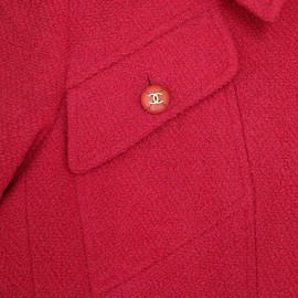 Veste T 36 CHANEL en tweed rose avec boutons avec inscription doré