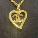 Collier CHANEL coeur CC doré