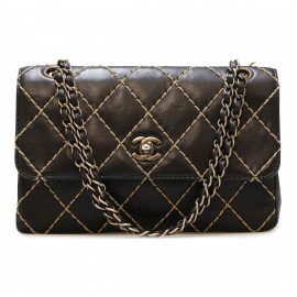 Sac CHANEL noir coutures beige