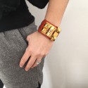 HERMES Medor headline in orange crocodile and gold jewelry