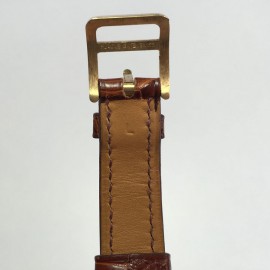 Montre Kelly HERMES bracelet en alligator marron et bijouterie plaqué or