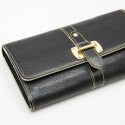 LOUIS VUITTON clutch in black grained leather with saddle stitching