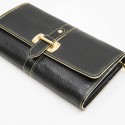 LOUIS VUITTON clutch in black grained leather with saddle stitching