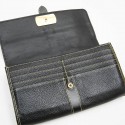 LOUIS VUITTON clutch in black grained leather with saddle stitching