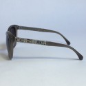 Lunettes de soleil CHANEL en plastique beige avec brillants sur les branches