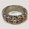 CHANEL rigid bracelet in multicolored tweed