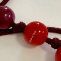 Sautoir LANVIN boules rouges et violettes par ALBER ELBAZ