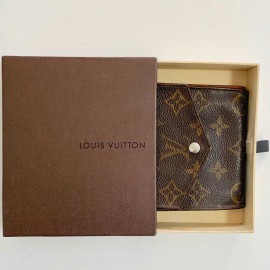 Portefeuille LOUIS VUITTON compact vintage en toile monogram marron