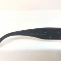 Lunettes de soleil CHANEL noires et camélia blanc