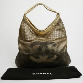 Sac CHANEL cuir perforé doré 