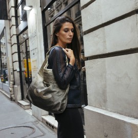 Sac CHANEL cuir perforé doré 