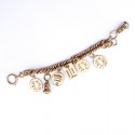 CHANEL Charms Bracelet in Gilt Metal